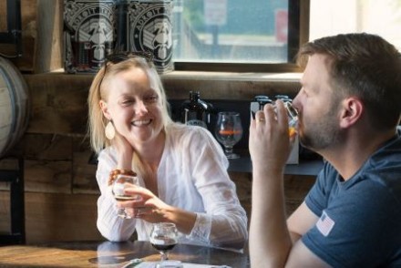 A couple enjoying a tasting at Adroit